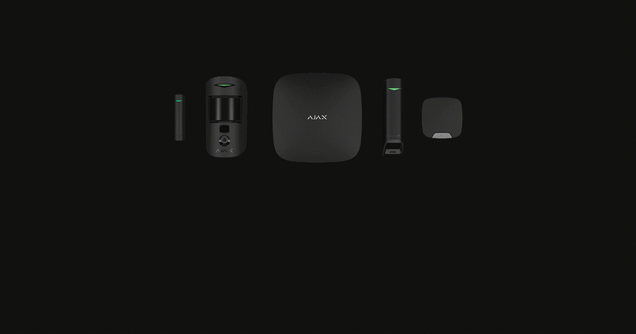 Componentes de un kit de seguridad profesional Ajax en color negro integrados sobre un salón