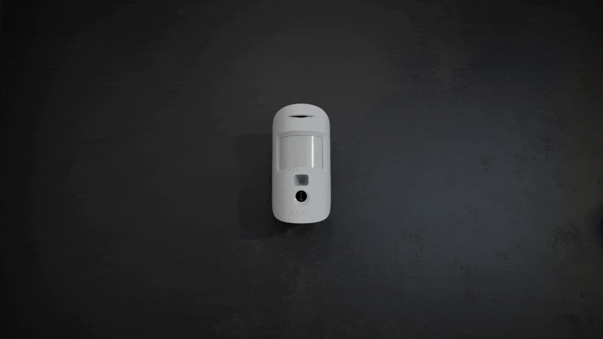 GIF mostrando MotionCam Ajax capturando imágenes y enviando una notificación con fotoverificación al smartphone